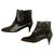 Chanel CC black leather and patent ankle boots Lambskin  ref.232938
