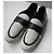 CHANEL Mocassini uomo intrecciati in pelle bianca e nera T44 IT Nero Bianco - vista 10
