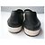 CHANEL Mocassini uomo intrecciati in pelle bianca e nera T44 IT Nero Bianco - vista 5