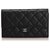 Portafoglio Chanel in pelle nera classica con patta Nero  ref.236531