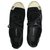 Chanel Scarpe da ginnastica basse in pelle scamosciata Nero Bianco Svezia Di gomma  ref.240437