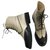 Chanel Combat boots Black Beige Leather Rubber  ref.241559