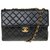 Classique Majestueux sac à main Chanel Timeless Jumbo en cuir d'agneau matelassé noir, garniture en métal doré  ref.241960