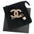 Broche CC Chanel Dourado Metal  ref.242378