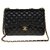 Lovely Chanel Timeless Jumbo handbag in black quilted lambskin, garniture en métal doré Leather  ref.247102