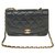 Sehr schicke Chanel Diana Tasche aus schwarzem gestepptem Leder, garniture en métal doré Lammfell  ref.249916