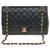Superba borsa Chanel Timeless foderata con patta in pelle di agnello trapuntata nera, garniture en métal doré Nero Agnello Pelle  ref.250082