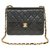 Timeless Esplêndida bolsa Chanel Mini atemporal em pele de cordeiro acolchoada preta, guarnição de metal banhado a ouro Preto Couro  ref.251980
