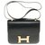 Splendide Hermès Constance en cuir box noir, garniture en métal doré en superbe état  ref.257089