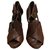 Hermès Sandals Dark brown Leather  ref.262135