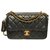 Magnífico bolso de bolsillo frontal Chanel Camera en cuero acolchado negro, guarnición en métal doré  ref.262996