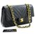 Chanel 2.55 Bolso de hombro con cadena y solapa forrado con puntada en V Piel de cordero negra Negro Cuero  ref.263502