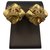 Chanel gold tone metal earrings ribbon Golden Gold-plated  ref.264179