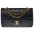 A bolsa Chanel Timeless muito procurada 23cm em couro preto acolchoado, garniture en métal doré  ref.266313