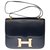 Splendida Hermès Constance 23 in pelle box blu navy, finiture in metallo placcato oro  ref.266419
