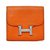 Hermès CONSTANCE COMPACT ORANGE WALLET Silver hardware Leather  ref.272317