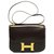 Splendide Sac Hermès Constance 23 en cuir box marron, garniture en métal doré  ref.274342