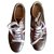 Moncler low-top trainers Golden Leather  ref.274854