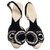 Chanel Camellia sandals Black Eggshell Leather  ref.275999