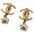 Chanel Brincos com logo flor CC Gold hardware Metal  ref.277137