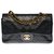 A bolsa Chanel Timeless muito procurada 23cm com aba forrada em couro preto acolchoado, garniture en métal doré  ref.277814