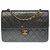 Timeless Bolsa Chanel Clássica Esplêndida 25cm em couro preto acolchoado, garniture en métal doré  ref.284275