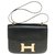 Espléndido bolso Hermès Constance 23 caja de cuero negro, guarnición en métal doré  ref.287160