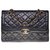 Timeless Chanel Classic bag in black quilted lambskin, garniture en métal doré Leather  ref.289713