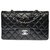 A bolsa Chanel Timeless muito procurada 23cm em couro preto acolchoado, Garniture en métal argenté  ref.295070