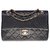 Classique Le très recherché sac Chanel Timeless 23cm à double rabat en cuir matelassé noir, garniture en métal doré  ref.300949