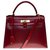 Exceptional Hermès Kelly bag 32 shoulder strap in Red H box leather customized with red crocodile Exotic leather  ref.301369
