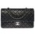 Superba borsa media Chanel Timeless 25cm in pelle trapuntata nera, Garniture en métal argenté Nero  ref.307850