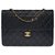Timeless Bolsa Chanel Classique em pele de cordeiro acolchoada preta, garniture en métal doré Preto Couro  ref.307860