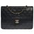 Timeless Bolsa Chanel Classique em pele de cordeiro acolchoada preta, garniture en métal doré Preto Couro  ref.307862