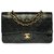 Splendida borsa Chanel Timeless 25cm con patta foderata in pelle trapuntata nera, garniture en métal doré Nero  ref.313350