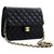 CHANEL Small Chain Shoulder Bag Clutch Black Quilted Flap Lambskin Leather  ref.314376
