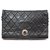 CLASSIC CHANEL BAG WITH FLAP CLASP CHANEL PERFORATED INSCRIPTION Black Leather  ref.320174