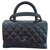 Coco Handle Chanel Handbags Black Leather  ref.323318