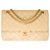 Timeless Esplêndida bolsa Chanel Classique em couro bege acolchoado, garniture en métal doré  ref.330515