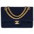 Timeless Chanel Excelente bolsa atemporal com aba forrada em jersey acolchoado azul marinho , garniture en métal doré Pano  ref.333248