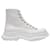 Alexander Mcqueen Tread Slick Sneakers aus schwarzem Canvas und silberner Gummisohle Leder  ref.338571