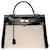 Hermès Stunning Hermes Kelly handbag 35 inverted cm in black box leather and beige canvas, garniture en métal doré  ref.341489