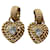 Boucles d'oreilles Yves Saint Laurent dorées en métal  - vue 1