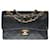 Classique Le très convoité Sac Chanel Timeless 23cm à double rabat en cuir d'agneau noir matelassé, garniture en métal doré  ref.366662