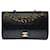 Magnífico bolso Chanel Timeless Medium 25cm con solapa forrada en piel de cordero acolchada negra, guarnición en métal doré Negro Cuero  ref.381681