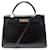 Hermès VINTAGE SAC A MAIN HERMES KELLY 33 CUIR BOX NOIR BANDOULIERE LEATHER HAND BAG  ref.383303