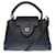 Splendida borsa Louis Vuitton Capucines BB serie limitata bicolore è realizzata in pelle Taurillon blu navy con bordatura rossa dei bordi, raccordi in metallo argentato  ref.384774