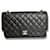Chanel Medium Classic gefütterte Flap Bag aus Kaviarleder Schwarz  ref.385713