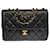 Timeless Chanel Esplêndida e rara bolsa de ombro Classic Flap em couro preto acolchoado, garniture en métal doré  ref.388178