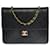 Timeless Bolsa de ombro esplêndida Chanel Flap em couro preto acolchoado, garniture en métal doré  ref.388363